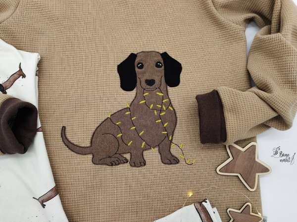 Dackel mit Lichterkette - doodle Stickdatei